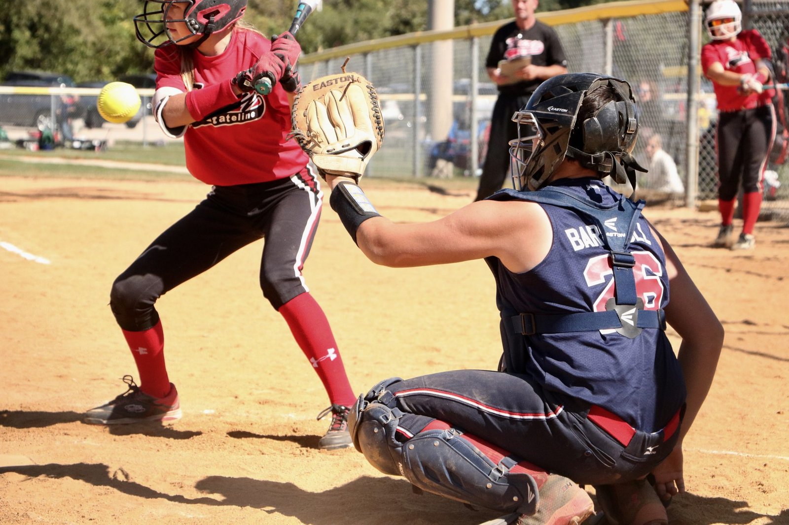 Difference Between Fastpitch and Slowpitch Softball Games